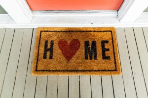 A doormat saying Home with a loveheart, not symbolic of a sole occupancy order at all.