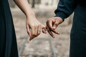 Linking hands as a symbol of marriage and prenuptial agreements in Australia